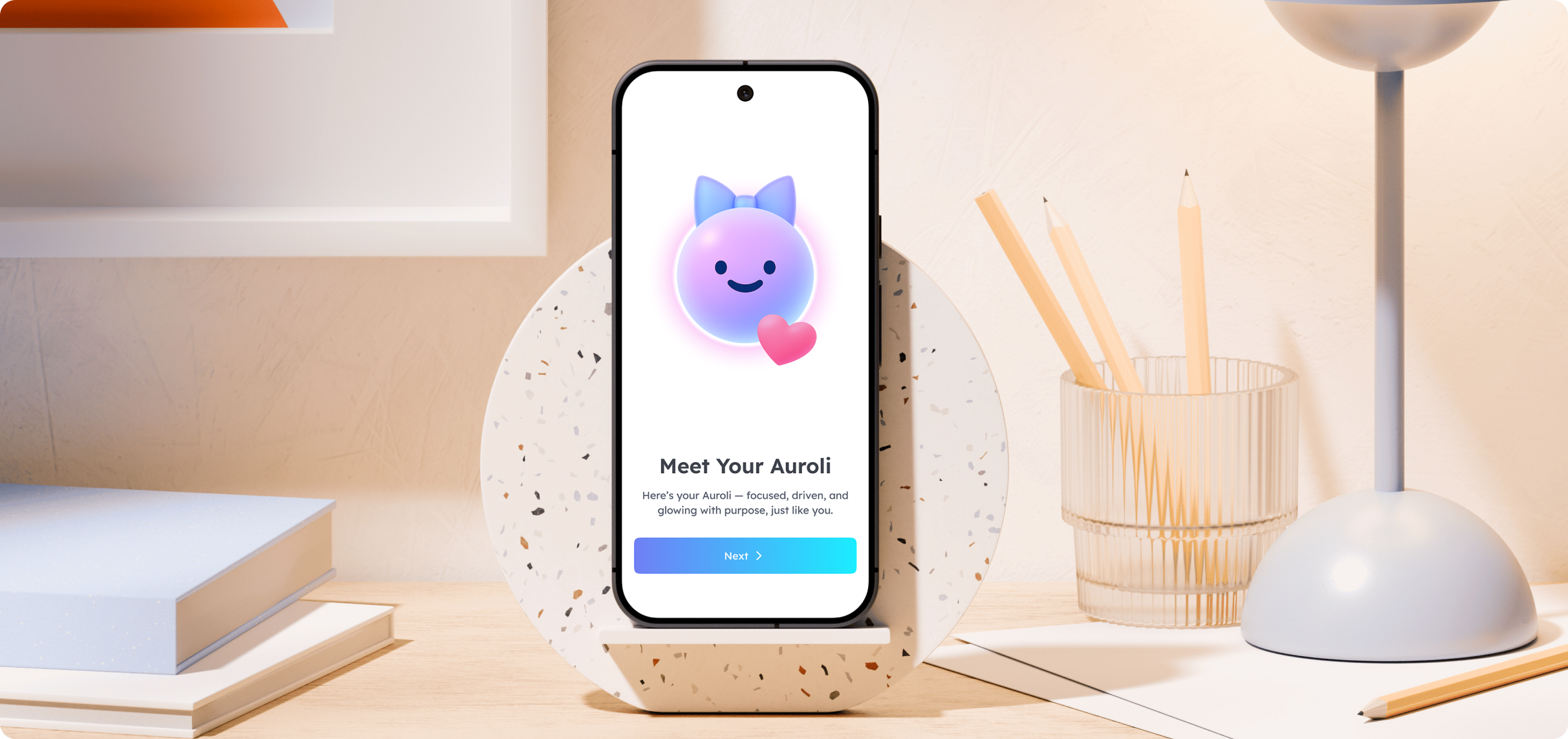 Auroli mobile app shown on a phone resting on a desk